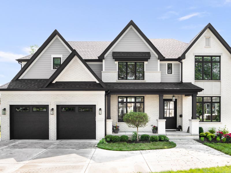 White brick house exterior freshly painted by Dixon Painting in Atlanta, GA