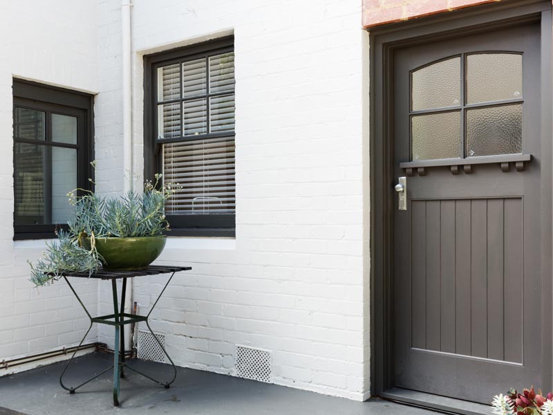 White painted brick entryway of a house by Dixon Painting in Atlanta, GA