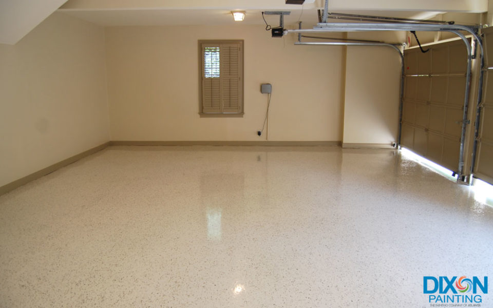 Clean coated garage floor highlighting the benefits of painting in Atlanta and Roswell, GA
